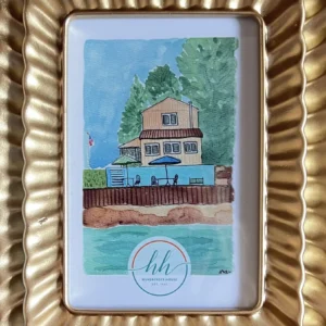 Pen and watercolor illustration of Hunsberger House as seen from the water, showing beach and patio.
